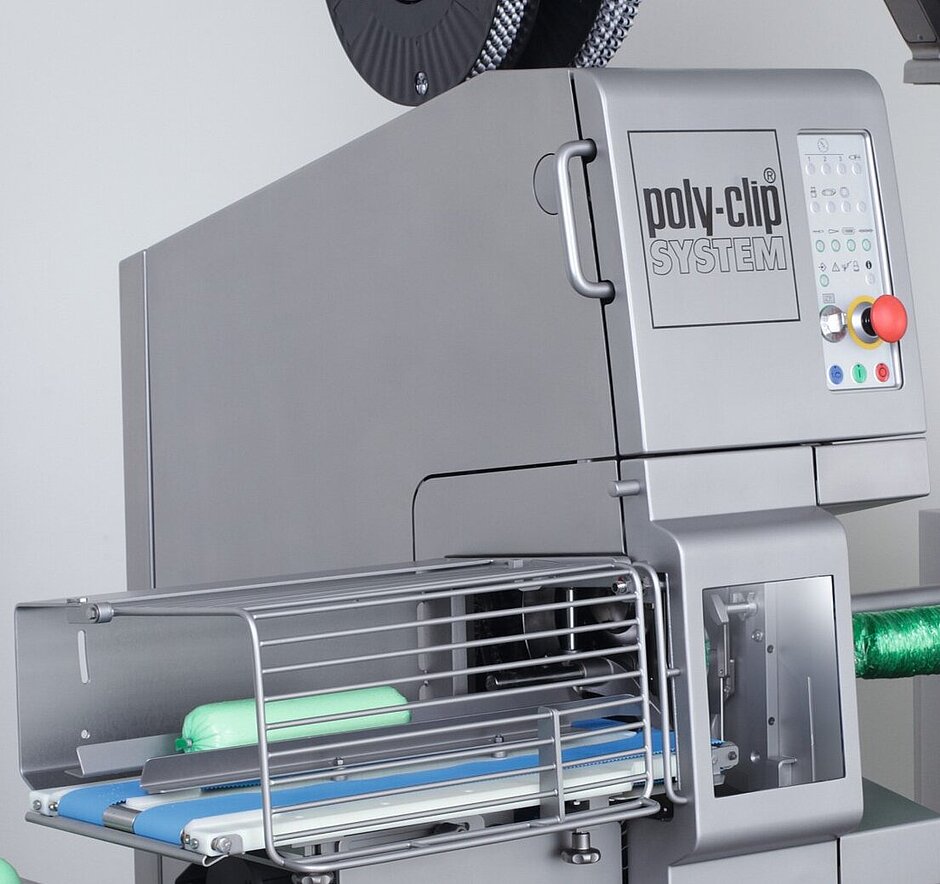 Clipping machine in operation